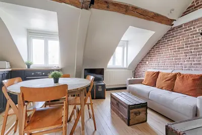 Coin salon dans l'établissement MyKeypers - Fantastic Designed Parisan LOFT 2BR/6P- Le Marais