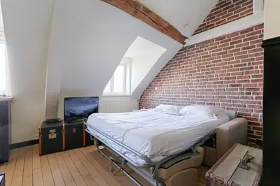 Un ou plusieurs lits dans un hébergement de l'établissement MyKeypers - Fantastic Designed Parisan LOFT 2BR/6P- Le Marais
