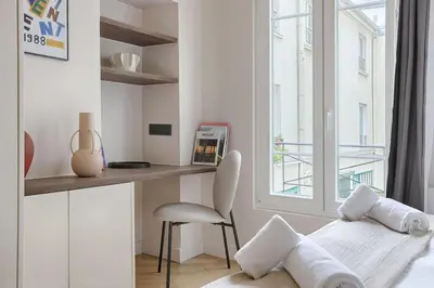 Un ou plusieurs lits dans un hébergement de l'établissement MyKeypers - Luxury & Design Flat 1BR/4P- Bastille