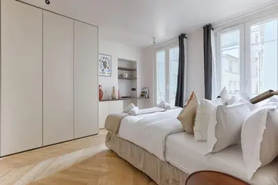 Un ou plusieurs lits dans un hébergement de l'établissement MyKeypers - Luxury & Design Flat 1BR/4P- Bastille