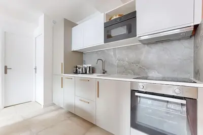 Cuisine ou kitchenette dans l'établissement MyKeypers - Chic & Elegant Flat 2BR/6P- République