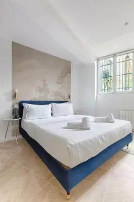 Un ou plusieurs lits dans un hébergement de l'établissement MyKeypers - Chic & Cozy Flat 4P - République