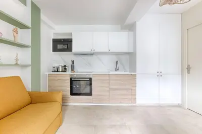 Cuisine ou kitchenette dans l'établissement MyKeypers - Chic & Cozy Flat 4P - République