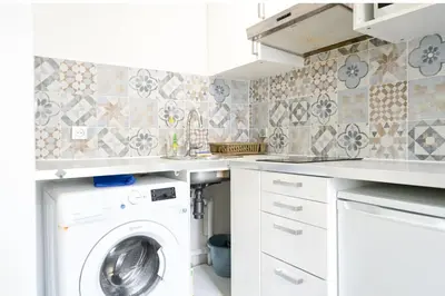 Cuisine ou kitchenette dans l'établissement Au cœur de Montmartre Paris lovers