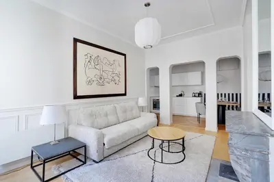 Coin salon dans l'établissement Appartement Moderne Champs-Elysées - Saint Honoré