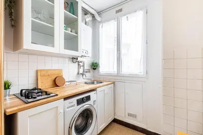 Cuisine ou kitchenette dans l'établissement GuestReady - Espace Cosy au Cœur de la Ville