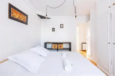 Un ou plusieurs lits dans un hébergement de l'établissement GuestReady - Espace Cosy au Cœur de la Ville