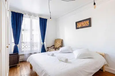 Un ou plusieurs lits dans un hébergement de l'établissement GuestReady - Espace Cosy au Cœur de la Ville