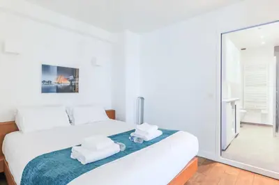 Un ou plusieurs lits dans un hébergement de l'établissement Bastille - Elegant duplex loft -6P