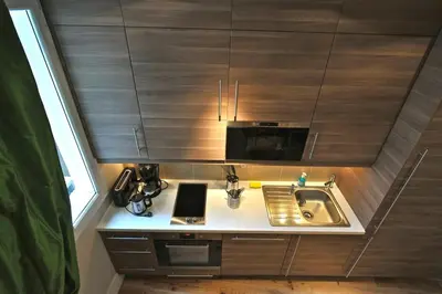 Cuisine ou kitchenette dans l'établissement A Balcony on Notre Dame
