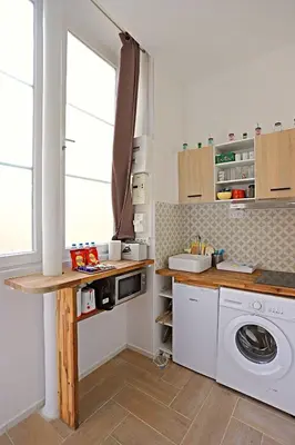 Cuisine ou kitchenette dans l'établissement Beautiful Apartment 11st District