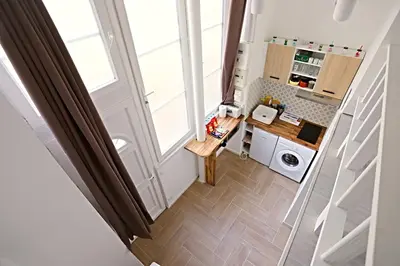 Cuisine ou kitchenette dans l'établissement Beautiful Apartment 11st District