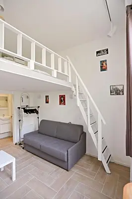 Coin salon dans l'établissement Beautiful Apartment 11st District