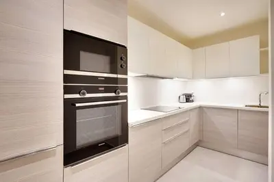 Cuisine ou kitchenette dans l'établissement Raffinement et Confort dans cette Résidence à Levallois-Perret