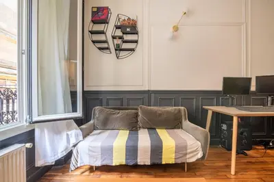 Un ou plusieurs lits dans un hébergement de l'établissement Charming and cosy apartment near Montmartre and Stade de France