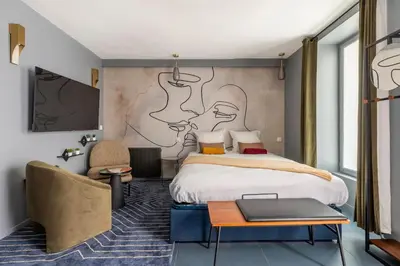 Un ou plusieurs lits dans un hébergement de l'établissement Opéra, Grand Boulevard 9ème, suite avec jacuzzi