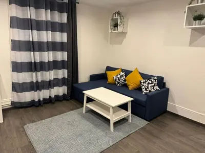 Coin salon dans l'établissement Cosi apartment near La Défense
