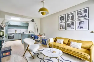 Coin salon dans l'établissement Charming love nest in Paris