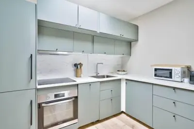 Cuisine ou kitchenette dans l'établissement Charming love nest in Paris