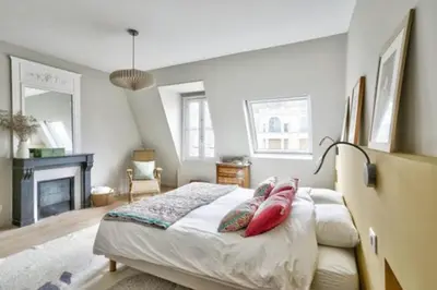 Un ou plusieurs lits dans un hébergement de l'établissement Charming love nest in Paris
