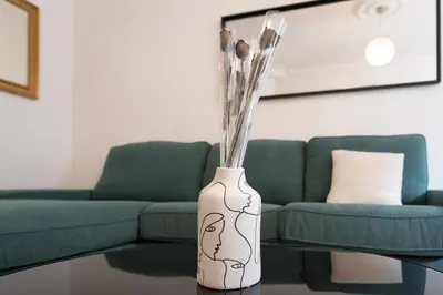 Coin salon dans l'établissement Appartement de luxe Champs Elysees Neuf