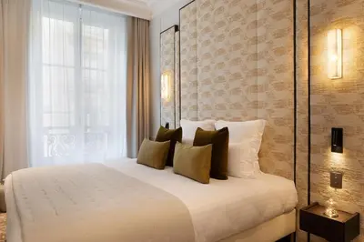 Un ou plusieurs lits dans un hébergement de l'établissement TheLander - Serviced Apartments in Champs Elysées