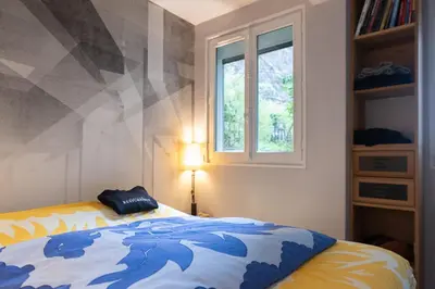 Un ou plusieurs lits dans un hébergement de l'établissement Spacious nest with terrace near Batignolles