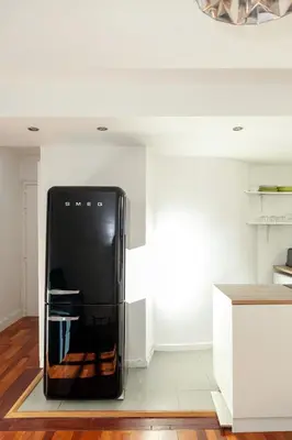 Cuisine ou kitchenette dans l'établissement Charmant appartement - 4 couchages à proximité d'Opéra