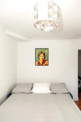 Un ou plusieurs lits dans un hébergement de l'établissement Charmant appartement - 4 couchages à proximité d'Opéra