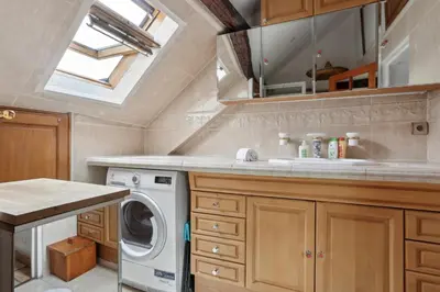 Cuisine ou kitchenette dans l'établissement Le Reflet Parisien – Rue de la Tour des Dames
