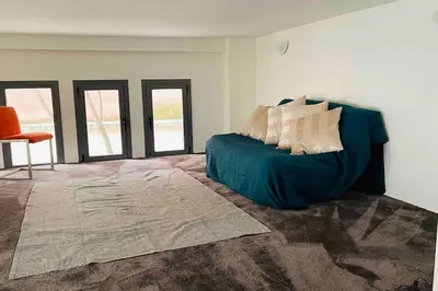Coin salon dans l'établissement Maison/loft Paris 14eme