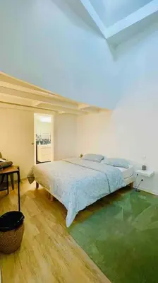 Un ou plusieurs lits dans un hébergement de l'établissement Maison/loft Paris 14eme