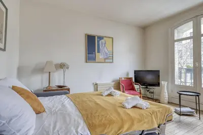 Un ou plusieurs lits dans un hébergement de l'établissement Classic & Charming Parisian flat - Luxury 16th