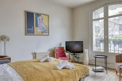 Un ou plusieurs lits dans un hébergement de l'établissement Classic & Charming Parisian flat - Luxury 16th