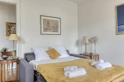 Un ou plusieurs lits dans un hébergement de l'établissement Classic & Charming Parisian flat - Luxury 16th