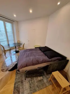 Coin salon dans l'établissement Appartement 35 m² dans le Marais