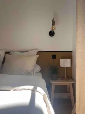 Un ou plusieurs lits dans un hébergement de l'établissement Appartement d'architecte, Paris-République 2P