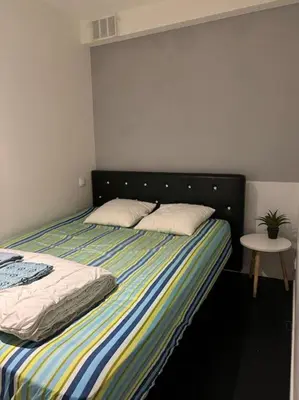 Un ou plusieurs lits dans un hébergement de l'établissement charmant appartement : la défense/Paris/Arena
