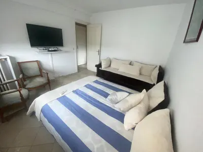 Un ou plusieurs lits dans un hébergement de l'établissement Appartement cosy Paris centre Montmartre