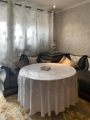 Coin salon dans l'établissement Appartement cosy Paris centre Montmartre