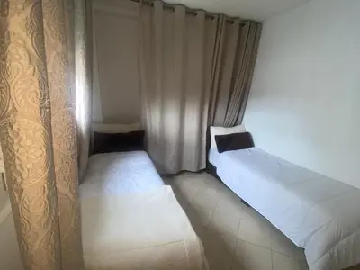 Un ou plusieurs lits dans un hébergement de l'établissement Appartement cosy Paris centre Montmartre