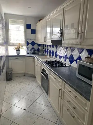 Cuisine ou kitchenette dans l'établissement Appartement cosy Paris centre Montmartre