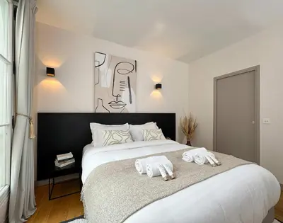 Un ou plusieurs lits dans un hébergement de l'établissement Saint Germain des Pres - Prestige apartment with lift for 6