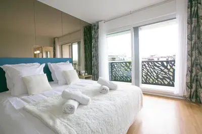 Un ou plusieurs lits dans un hébergement de l'établissement Majestic & Idyllic Parisian Flat - Champs-Elysées