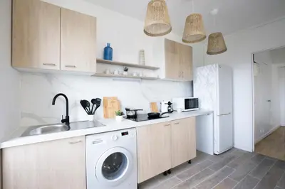Cuisine ou kitchenette dans l'établissement Majestic & Idyllic Parisian Flat - Champs-Elysées