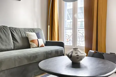 Coin salon dans l'établissement Prestige Luxury Flat 2BR 6P - Champ-Elysées