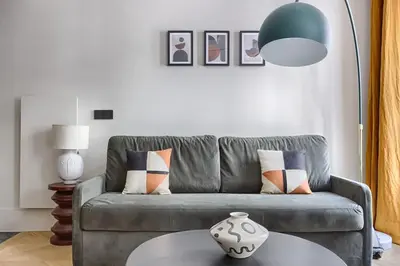 Coin salon dans l'établissement Prestige Luxury Flat 2BR 6P - Champ-Elysées