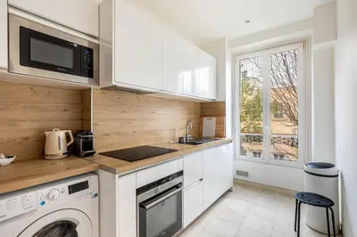 Cuisine ou kitchenette dans l'établissement GuestReady -Apt familial en bordure de la Capitale