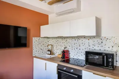 Cuisine ou kitchenette dans l'établissement PAVILLON EDEN