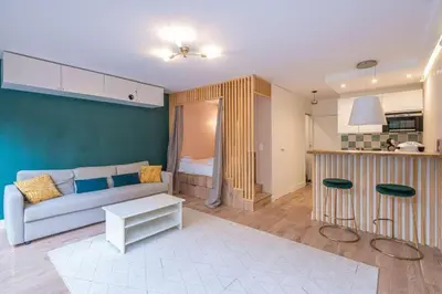 Cuisine ou kitchenette dans l'établissement Appartement design avec jardin privatif